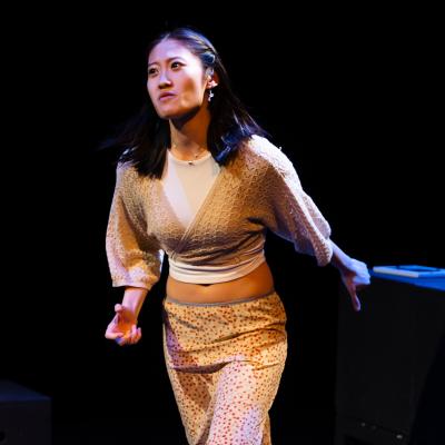 OUT OF TIME: An actress in motion, a pained expression.