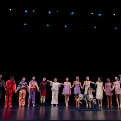 All dancers in concert in curtain call formation