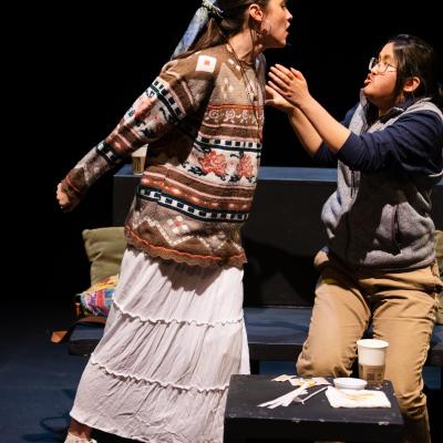 CAFE OF BABEL: Two actors standing, in motion, mid-argument